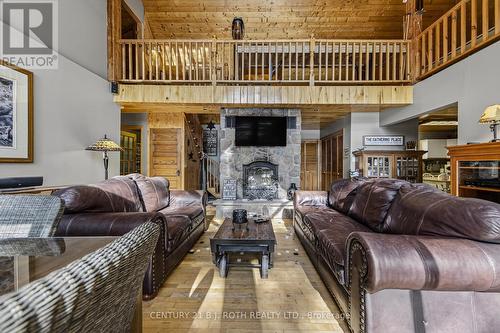 22 - 1213 Camp Jackson Road, Muskoka Lakes, ON - Indoor Photo Showing Living Room With Fireplace