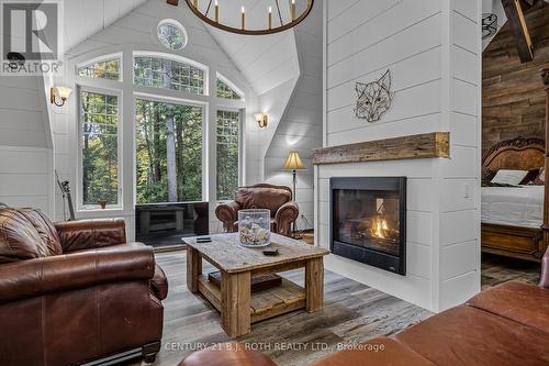 22 - 1213 Camp Jackson Road, Muskoka Lakes, ON - Indoor Photo Showing Living Room With Fireplace