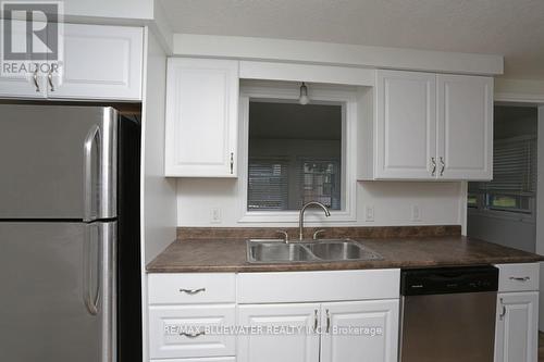 23 Pebble Beach Parkway E, South Huron (Stephen), ON - Indoor Photo Showing Kitchen With Double Sink