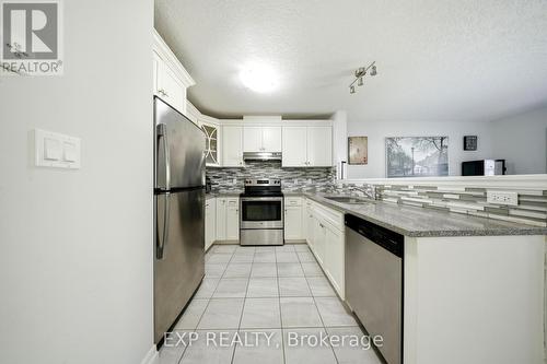 17 - 158 Fife Road, Guelph, ON - Indoor Photo Showing Kitchen With Stainless Steel Kitchen With Upgraded Kitchen