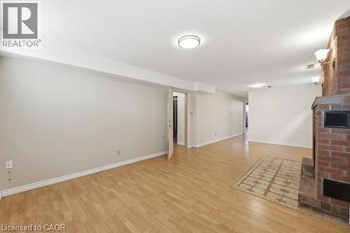 957 Stone Church Road E, Hamilton, ON - Indoor Photo Showing Other Room With Fireplace