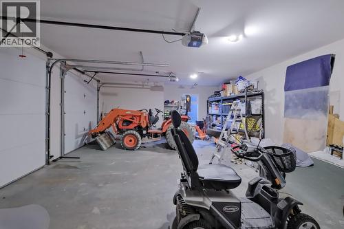 Large Double Garage - 2241 Rojem Road, Kelowna, BC - Indoor Photo Showing Garage