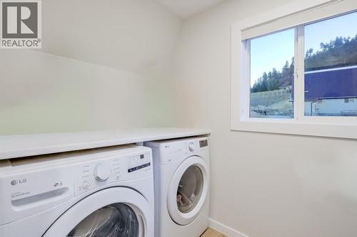 Carriage House Laundry - 2241 Rojem Road, Kelowna, BC - Indoor Photo Showing Laundry Room
