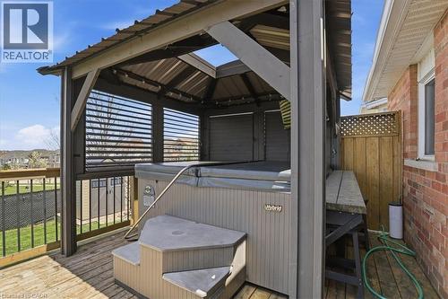 Outdoor spa area featuring a covered gazebo with a metal roof and louvered side panels - 136 Carpenter Road, Cambridge, ON - Indoor Photo Showing Laundry Room