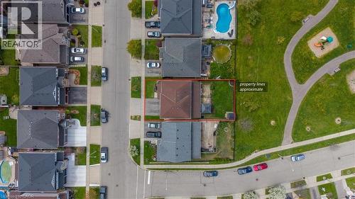 Aerial view of a residential property with a detached house and private backyard - 136 Carpenter Road, Cambridge, ON - Outdoor With View
