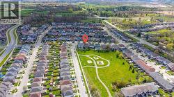 Aerial perspective showcasing a residential development with varied housing styles - 