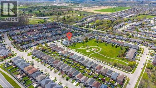 Aerial perspective of a developed residential neighborhood with a large central park - 136 Carpenter Road, Cambridge, ON - Outdoor With View