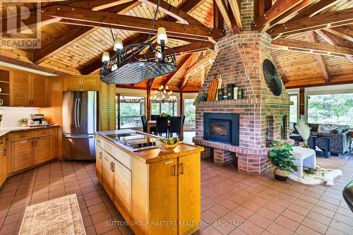 314 Baseline Road, Frontenac Islands (Howe Island), ON - Indoor Photo Showing Other Room With Fireplace