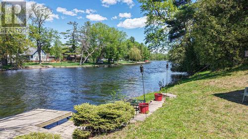 Decking and dock at water's edge - 4258 Canal Road, Severn, ON - Outdoor With Body Of Water With View