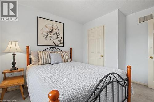 Light-filled interior space with white walls and light-toned carpet flooring - 236 Fitzgerald Crescent, Milton, ON - Indoor Photo Showing Bedroom