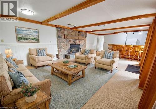 Virtually Staged Photo - 17 Cemetery Road, Norfolk County, ON - Indoor Photo Showing Living Room With Fireplace