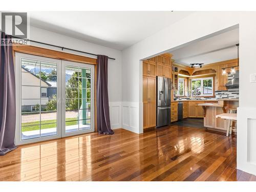 Dining room with doors to veranda - 701 Edward Street, Revelstoke, BC 