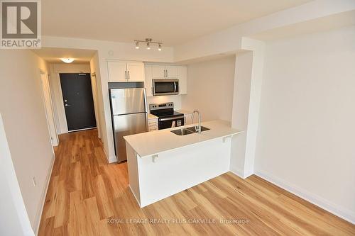 422 - 1936 Rymal Road E, Hamilton, ON - Indoor Photo Showing Kitchen With Stainless Steel Kitchen With Double Sink