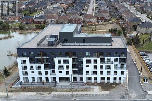422 - 1936 Rymal Road E, Hamilton, ON - Outdoor With Facade