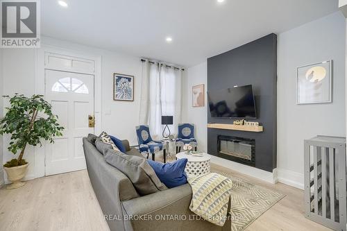 8 Elizabeth Street, St. Catharines, ON - Indoor Photo Showing Living Room With Fireplace