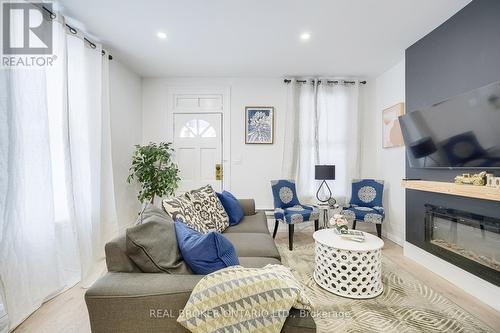 8 Elizabeth Street, St. Catharines, ON - Indoor Photo Showing Living Room With Fireplace