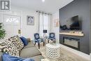 8 Elizabeth Street, St. Catharines, ON  - Indoor Photo Showing Living Room With Fireplace 