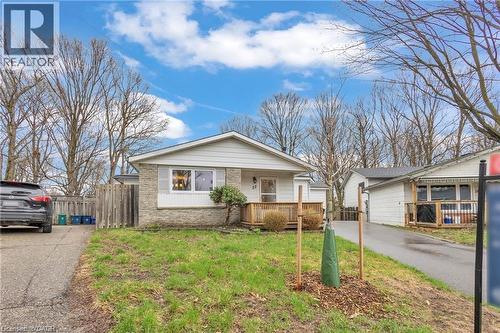 Ranch-style exterior with light-colored siding and a stone facade - 22 Blackhorne Crescent, Kitchener, ON - Outdoor