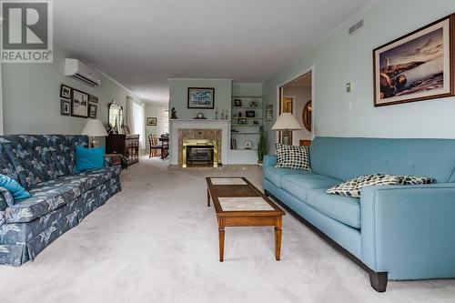 7 Viking Place, Corner Brook, NL - Indoor Photo Showing Living Room With Fireplace
