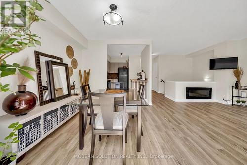 201 - 1000 Cedarglen Gate N, Mississauga, ON - Indoor With Fireplace