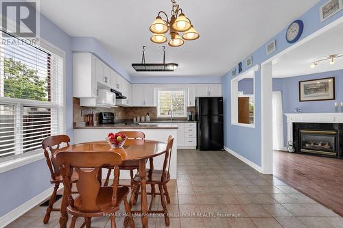 101 Downing Crescent, Barrie, ON - Indoor Photo Showing Dining Room With Fireplace