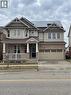 Two-story residence featuring a brick and siding exterior with a two-car garage - 222 Baldwin Drive, Cambridge, ON  - Outdoor With Facade 