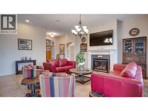 #8 Bayview Heights Lot# 8, Coldstream, BC - Indoor Photo Showing Living Room With Fireplace