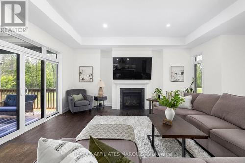 147 Golf Club Road, Rideau Lakes, ON - Indoor Photo Showing Living Room With Fireplace