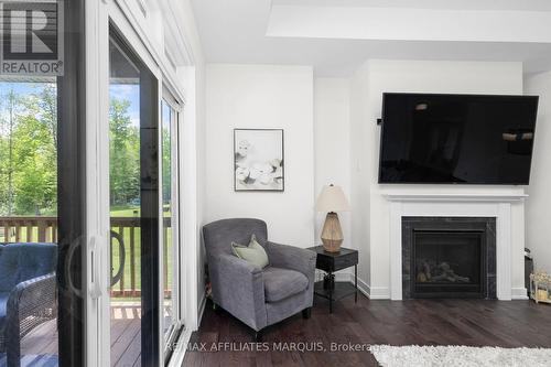 147 Golf Club Road, Rideau Lakes, ON - Indoor Photo Showing Living Room With Fireplace