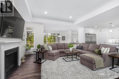 147 Golf Club Road, Rideau Lakes, ON - Indoor Photo Showing Living Room With Fireplace