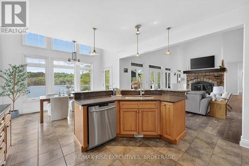 1206B Burnt Hills Road, Frontenac (Frontenac South), ON - Indoor Photo Showing Kitchen With Fireplace With Double Sink