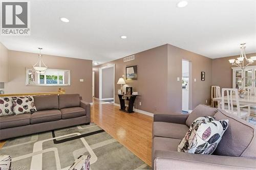 Hardwood-style flooring throughout living areas - 26 Sideroad 18, Fergus, ON - Indoor Photo Showing Living Room