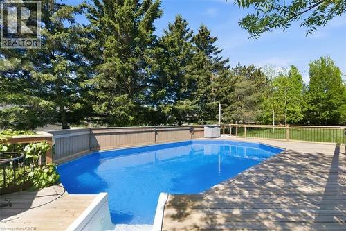 In-ground swimming pool featuring a blue liner - 26 Sideroad 18, Fergus, ON - Outdoor With In Ground Pool With Backyard