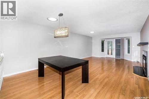 8 3415 Calder Crescent, Saskatoon, SK - Indoor Photo Showing Other Room With Fireplace