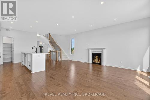 1415 Demers Avenue, Kingston (East Gardiners Rd), ON - Indoor Photo Showing Living Room With Fireplace