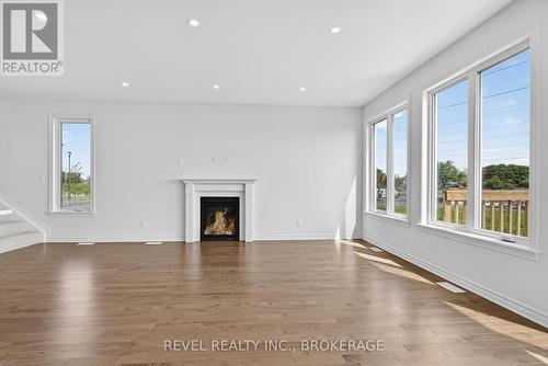 1415 Demers Avenue, Kingston (East Gardiners Rd), ON - Indoor Photo Showing Living Room With Fireplace