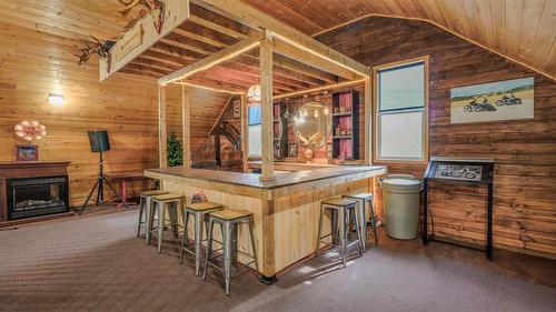 317 Pth 52 Highway W, Steinbach, MB - Indoor Photo Showing Other Room With Fireplace