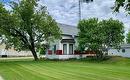 Lovely mature trees provide great shade - 125 Burrows Avenue N, Plumas, MB  - Outdoor 