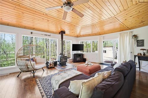 21 Ida Bay, Grand Marais, MB - Indoor Photo Showing Other Room With Fireplace