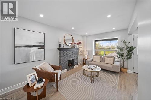 305 Weir Street N, Hamilton, ON - Indoor Photo Showing Living Room With Fireplace