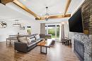 43 Seine River Crossing, Ste Anne, MB  - Indoor Photo Showing Living Room With Fireplace 