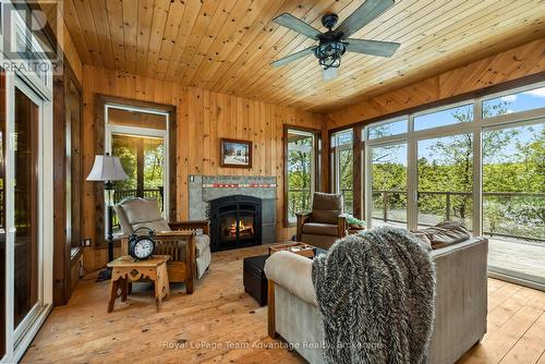 68 Lees Road, Mckellar, ON - Indoor Photo Showing Living Room With Fireplace