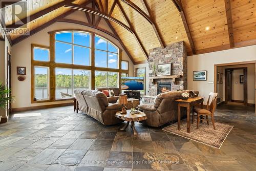 68 Lees Road, Mckellar, ON - Indoor Photo Showing Living Room With Fireplace