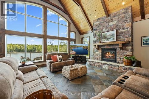68 Lees Road, Mckellar, ON - Indoor Photo Showing Living Room With Fireplace