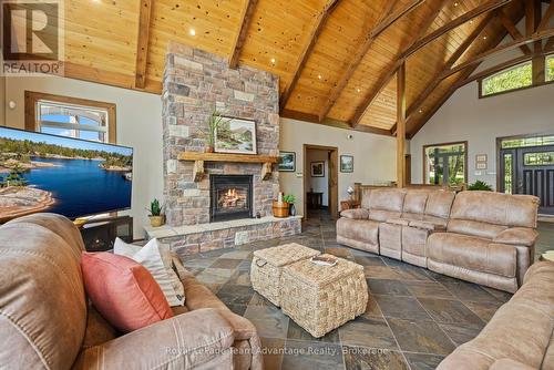 68 Lees Road, Mckellar, ON - Indoor Photo Showing Living Room With Fireplace