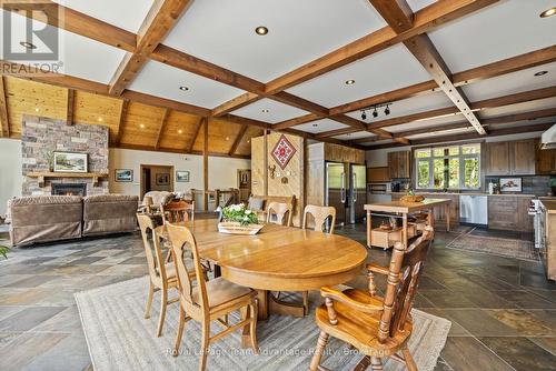 68 Lees Road, Mckellar, ON - Indoor Photo Showing Dining Room With Fireplace