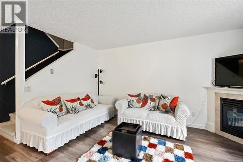 28 717 Aspen Rd, Comox, BC - Indoor Photo Showing Living Room With Fireplace