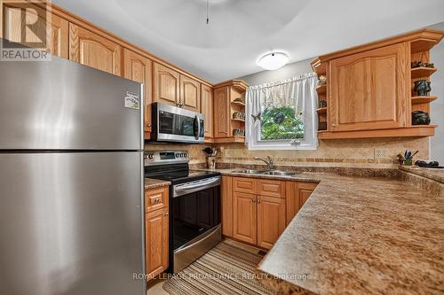 8 Bernard Crescent, Augusta, ON - Indoor Photo Showing Kitchen With Double Sink