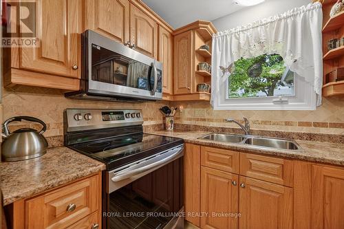 8 Bernard Crescent, Augusta, ON - Indoor Photo Showing Kitchen With Double Sink