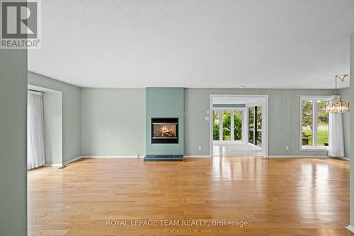13 Arbor Ridge, Ottawa, ON - Indoor Photo Showing Living Room With Fireplace